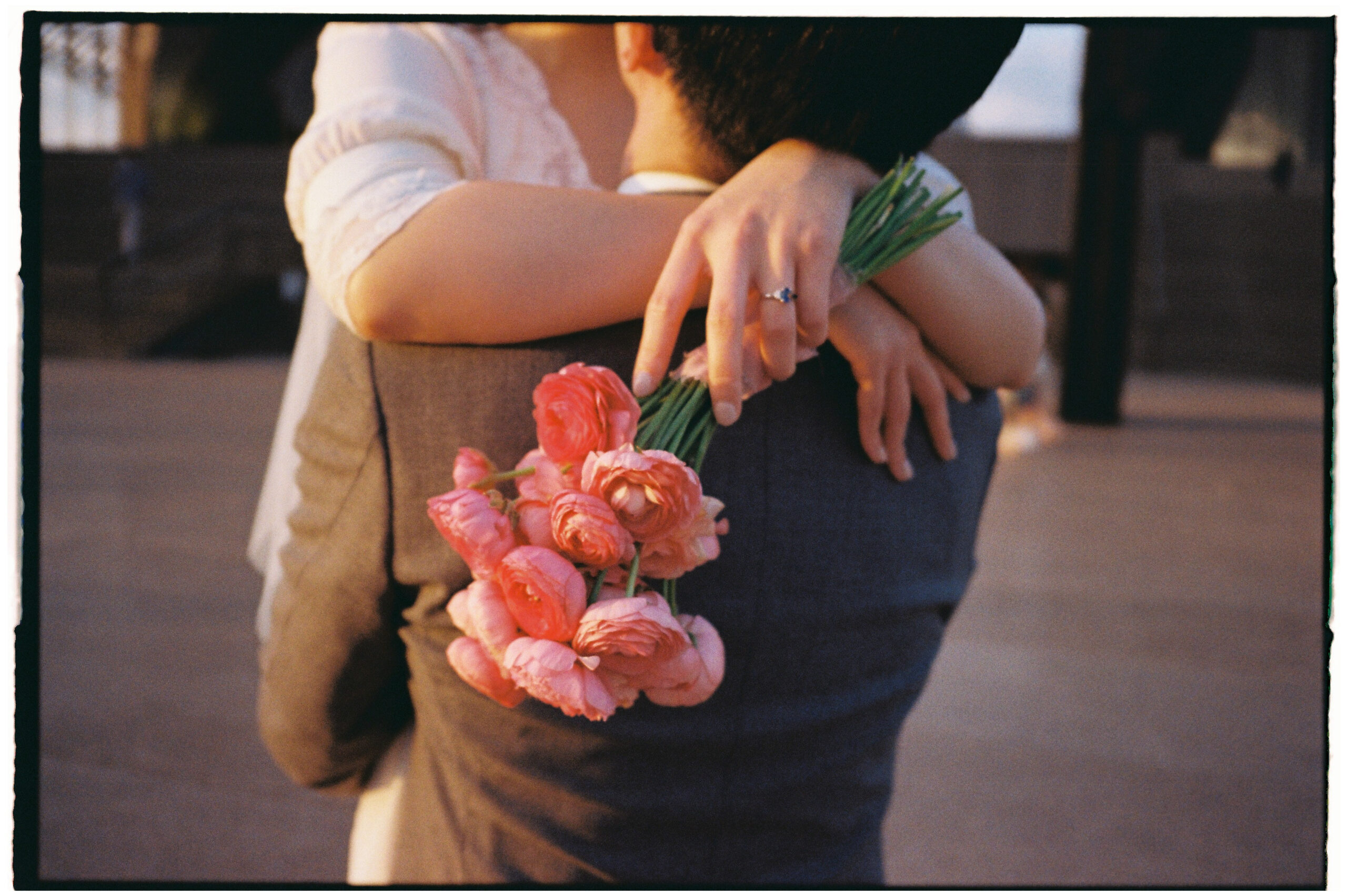 Candid and authentic engagement portrait photography at Sydney Opera House, captured in both film and digital