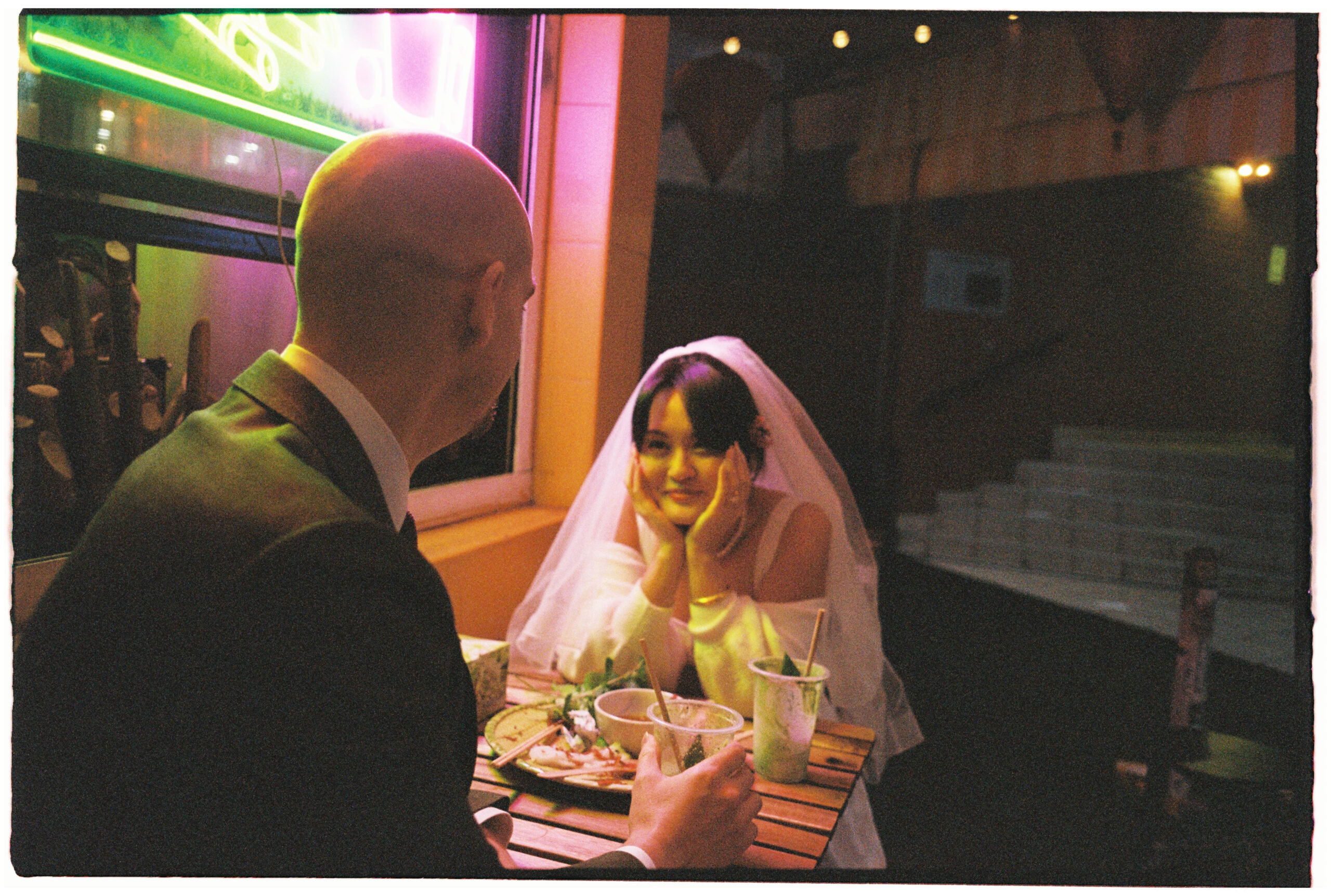 amantha & Evan sharing a candid moment on film during their pre-wedding Marrickville stroll, capturing authentic and nostalgic memories